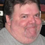 John R. “Taco” Presley